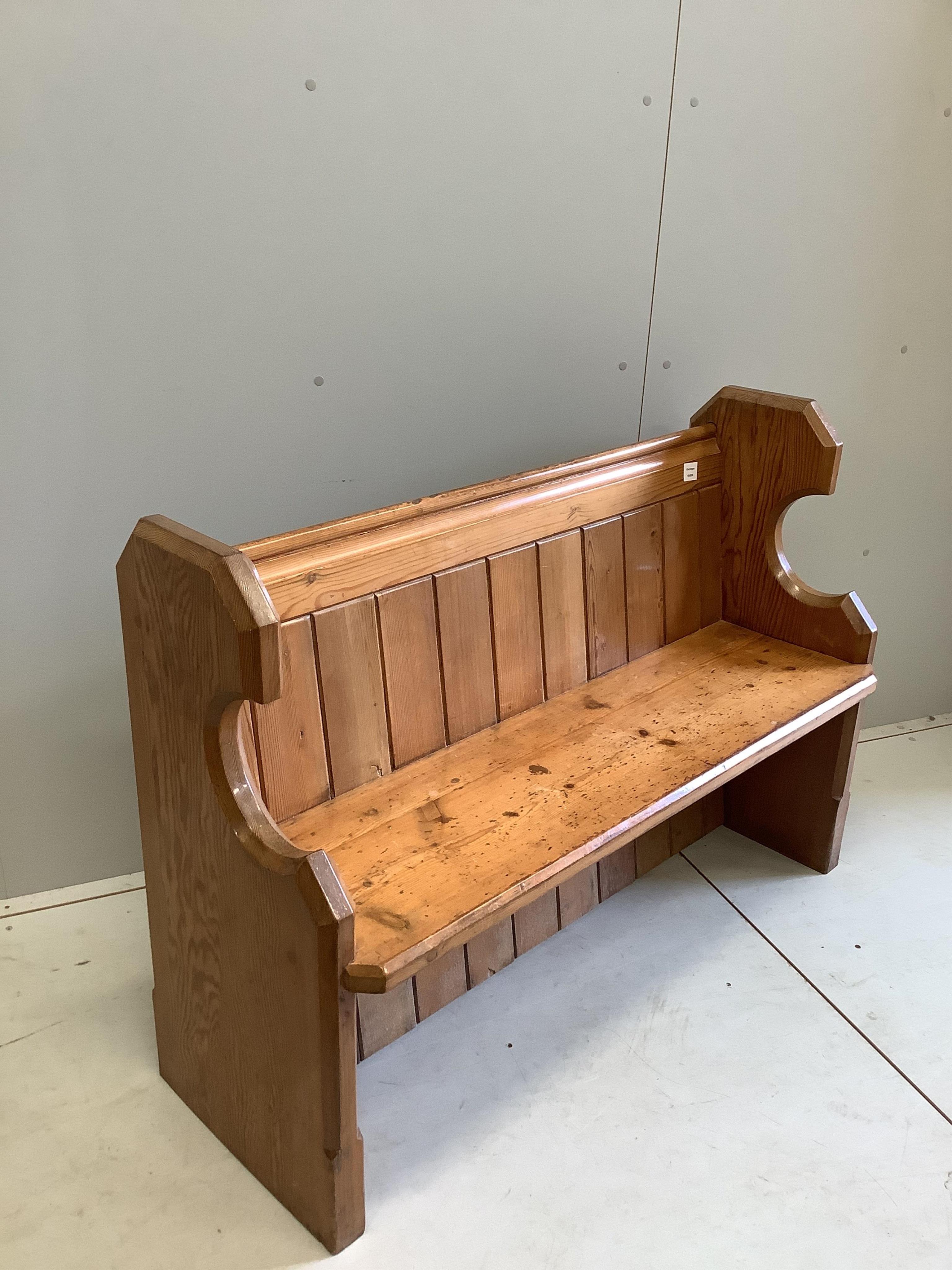 A Victorian pitch pine pew, width 123cm, depth 44cm, height 86cm. Condition - fair